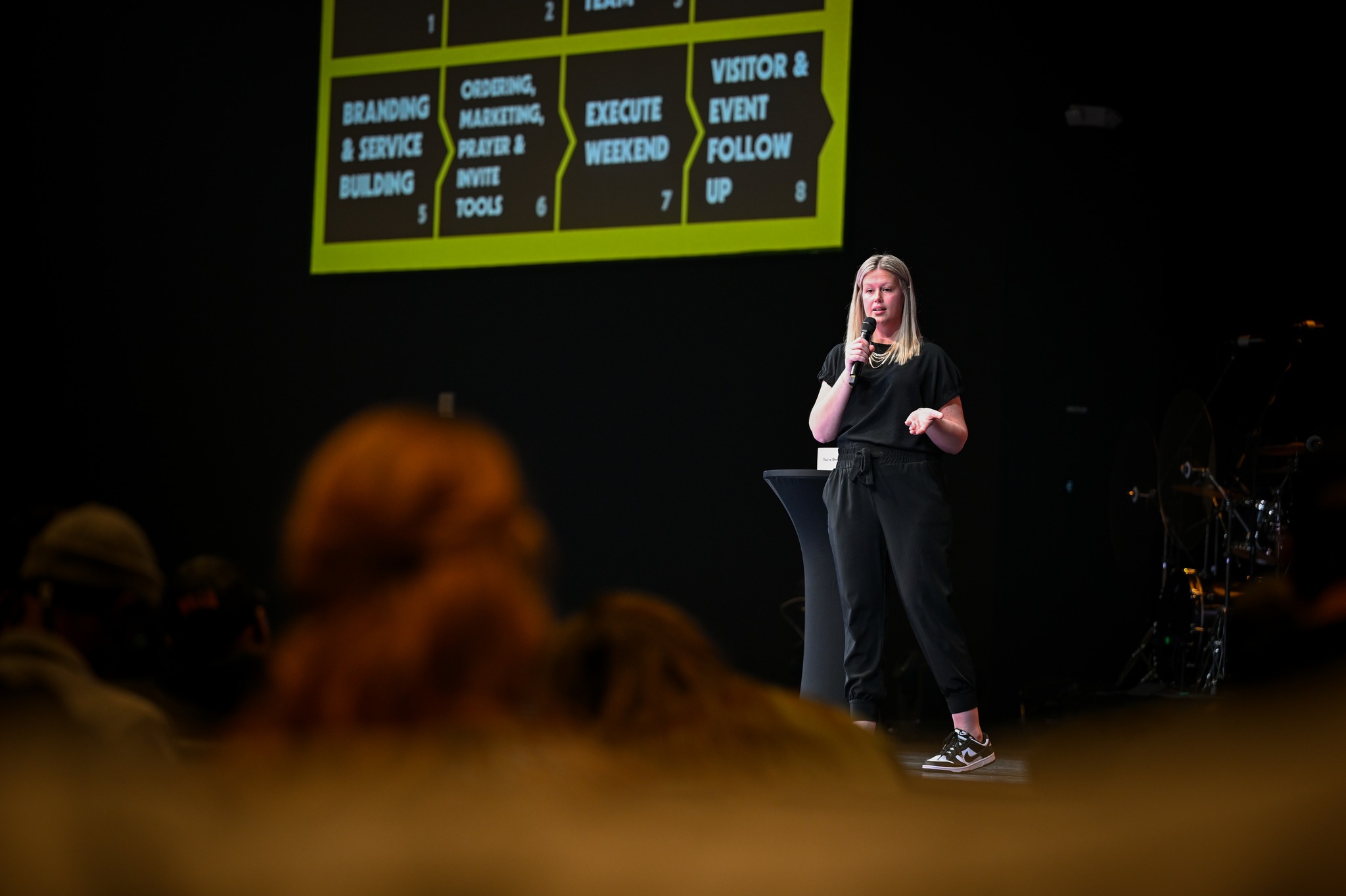 ACC speaker teaching in a large event room